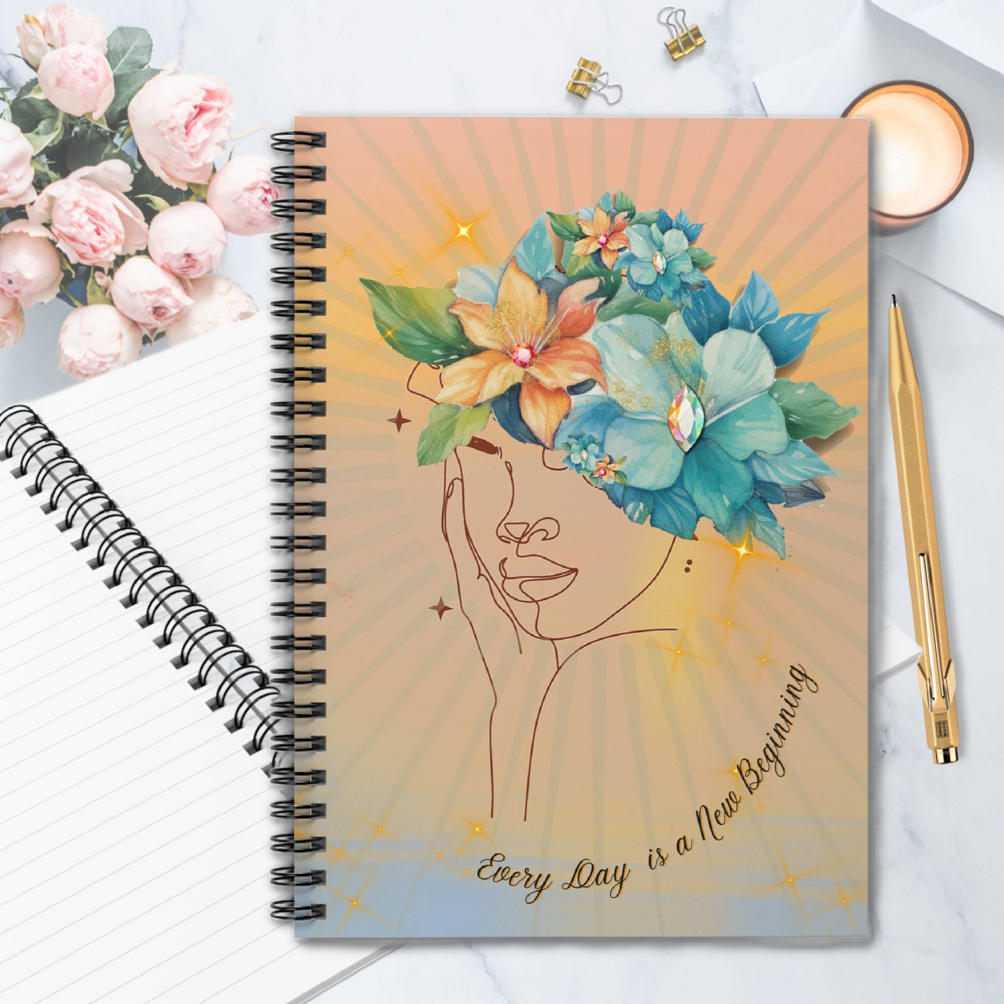 journal notebook with saying everyday is a new day